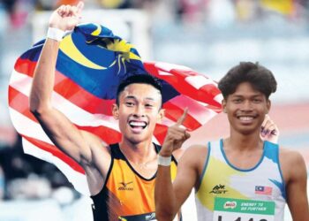 AZEEM Fahmi (kanan) dan Khairul Hafiz Jantan mara ke separuh akhir 100m Sukan Asia Hangzhou.