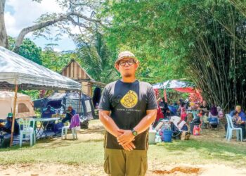 MUHAMMAD Luqman Irfan Ahmad Nazri mengusahakan Tapak Perkhemahan Santuari Buyongmas dan Sukan Air di Tanjung Malim. – UTUSAN/MEGAT LUTFI MEGAT RAHIM