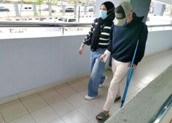 TERTUDUH ketika hadir pada prosiding keputusan kes terhadapnya di Kompleks Mahkamah Seremban, Negeri Sembilan hari ini.-UTUSAN/MOHD. SHAHJEHAN MAAMIM.