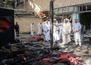 KEROSAKAN yang berlaku akibat serangan di Lapangan Terbang Antarabangsa Kuwait semalam. - AFP