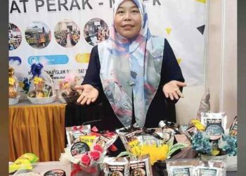 AZILA Md. Ali menyertai Program Pemerkasaan Ekonomi Asnaf di bawah MAIPk yang membantunya mengetahui selok-belok perniagaan, dibimbing dan diberikan bantuan peralatan perniagaan. - UTUSAN