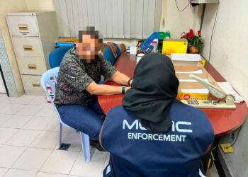 INDIVIDU yang dipanggil untuk dirakam percakapan di Ibu Pejabat Polis Daerah (IPD) Seremban.