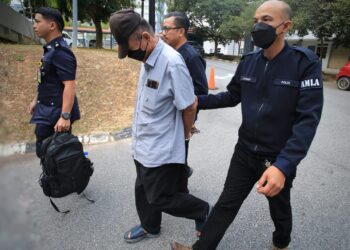 LAW Tuan Hai dibawa ke Mahkamah Sesyen, Seremban atas pertuduhan pengubahan wang haram dalam urusan jual beli hartanah di Mukim Kundor, daerah Rembau. - UTUSAN/MOHD SHAHJEHAN MAAMIN.